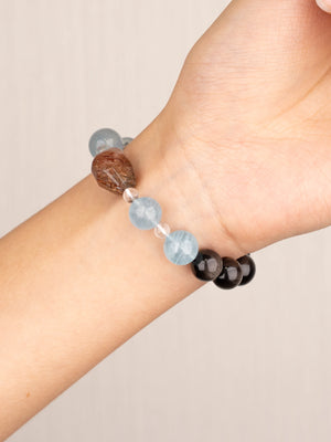 SENLLY Ocean Night Guardian - Beaded Bracelet with Natural Aquamarine, Silver Obsidian & Clear Quartz, Handcrafted Natural Stone Jewelry Featuring a Black Gold Super Seven Centerpiece